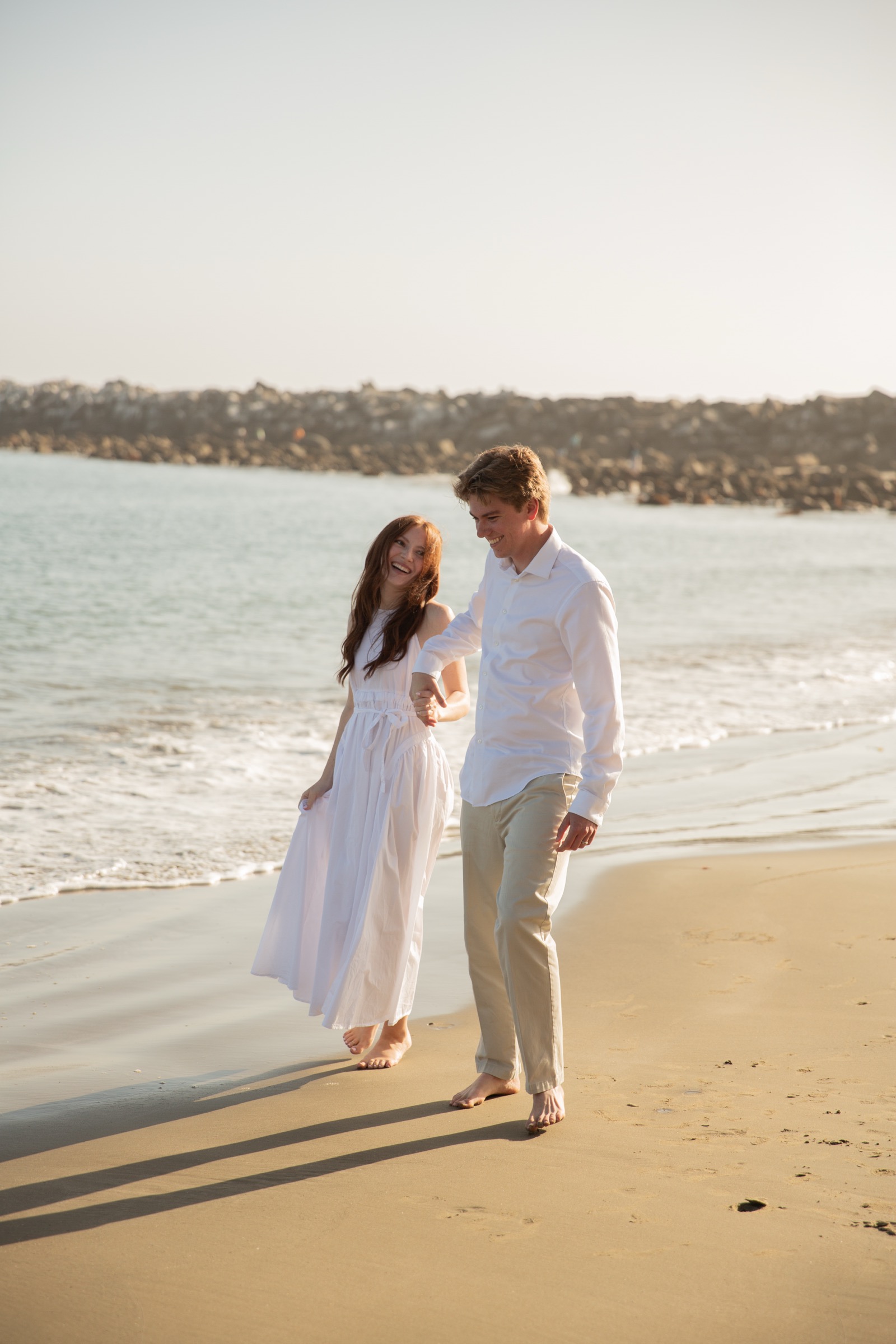 Cole and Bridget — Beach engagement moment